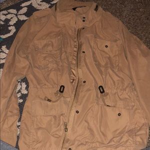 Tan jacket size small. Never worn!